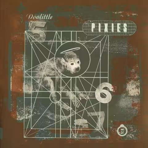 Front cover of Doolittle showing Simon Larbalestier's photograph of a monkey with a golden halo and the numbers five, six and seven, designed by Vaughan Oliver.