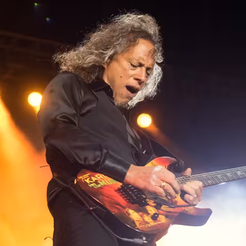 Kirk Hammett of Metallica playing his guitar on stage in Ecuador in 2016.