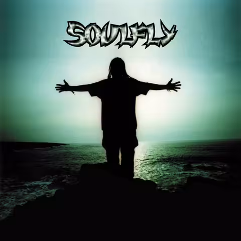 Front cover of Soulfly's 1998 self-titled debut: a stylised tribal-pattern artwork of a winged figure rising from flame, with the band name above.