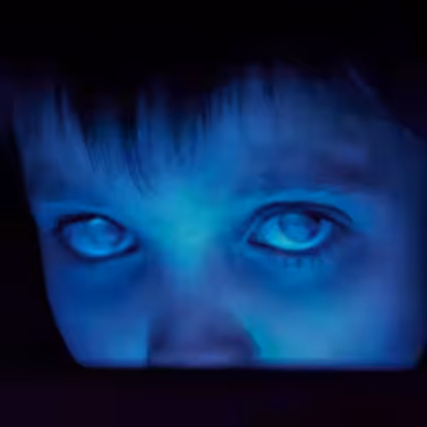 Album cover artwork for Fear of a Blank Planet by Porcupine Tree, designed by Danish photographer Lasse Hoile, showing a washed-out, faceless figure overlaid with the album title.