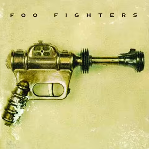 Front cover of Foo Fighters' 1995 self-titled debut album: a Buck Rogers XZ-38 Disintegrator Pistol toy ray gun photographed against a beige background, with the band name set above it, photographed and designed by Grohl's then-wife Jennifer Youngblood.