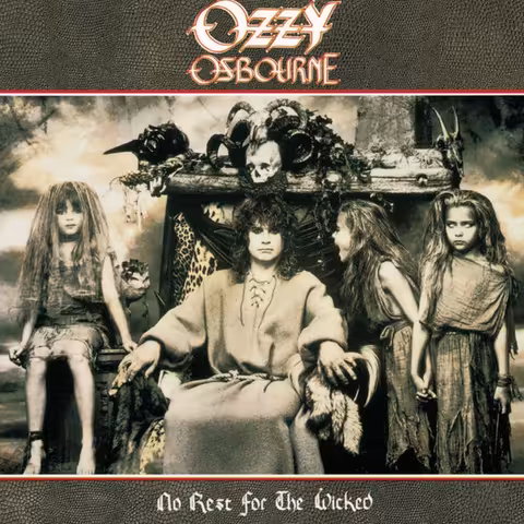 Sleeve of Ozzy Osbourne's 1988 album No Rest for the Wicked, photographed by Bob Carlos Clarke, showing the singer in a long dark coat surrounded by a group of children in a misty graveyard.