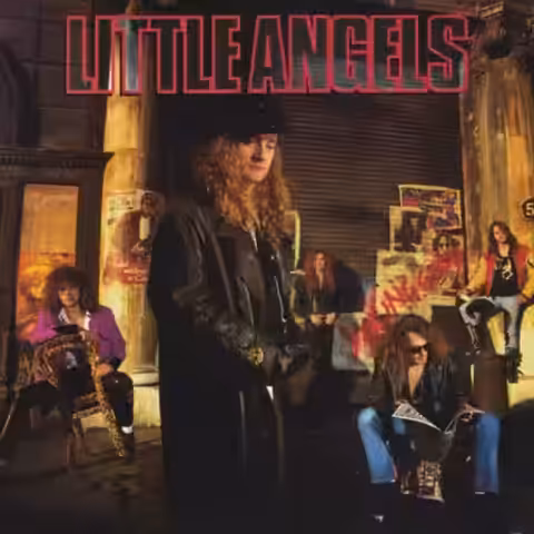 Front cover of Little Angels' 1991 album Young Gods, a moody close-up image of singer Toby Jepson and the band against a dark, painterly background, with the band logo set in bold gold lettering above the album title.