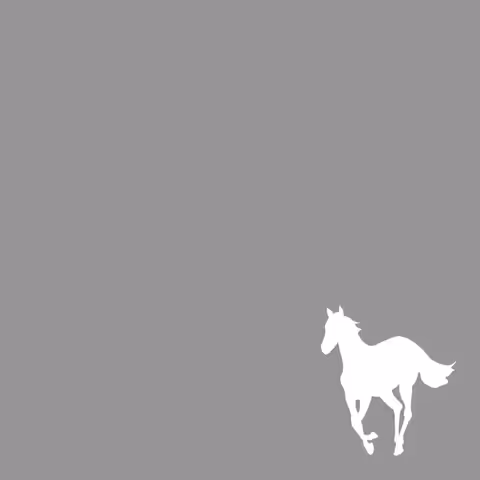 Front cover of Deftones' White Pony, the silver-and-black silhouette of a galloping pony against the album's minimalist field, the design that broke from the band's earlier hardcore-leaning artwork.