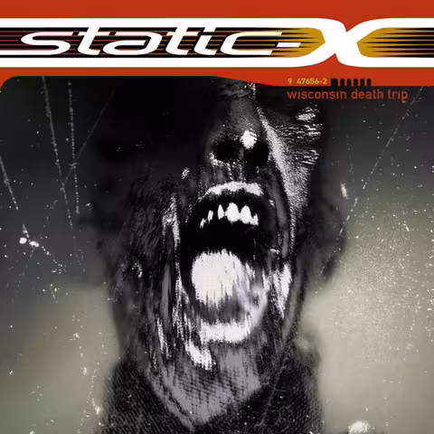 Front cover of Static-X's 1999 debut Wisconsin Death Trip: the distorted, mid-scream black-and-white face that became one of the defining metal-album images of the late nineties.