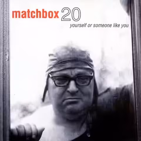 Front cover of Yourself or Someone Like You by Matchbox Twenty (1996): a Katrin Thomas photograph of Frank Torres walking alone down a sun-bleached road, his long shadow stretching behind him.