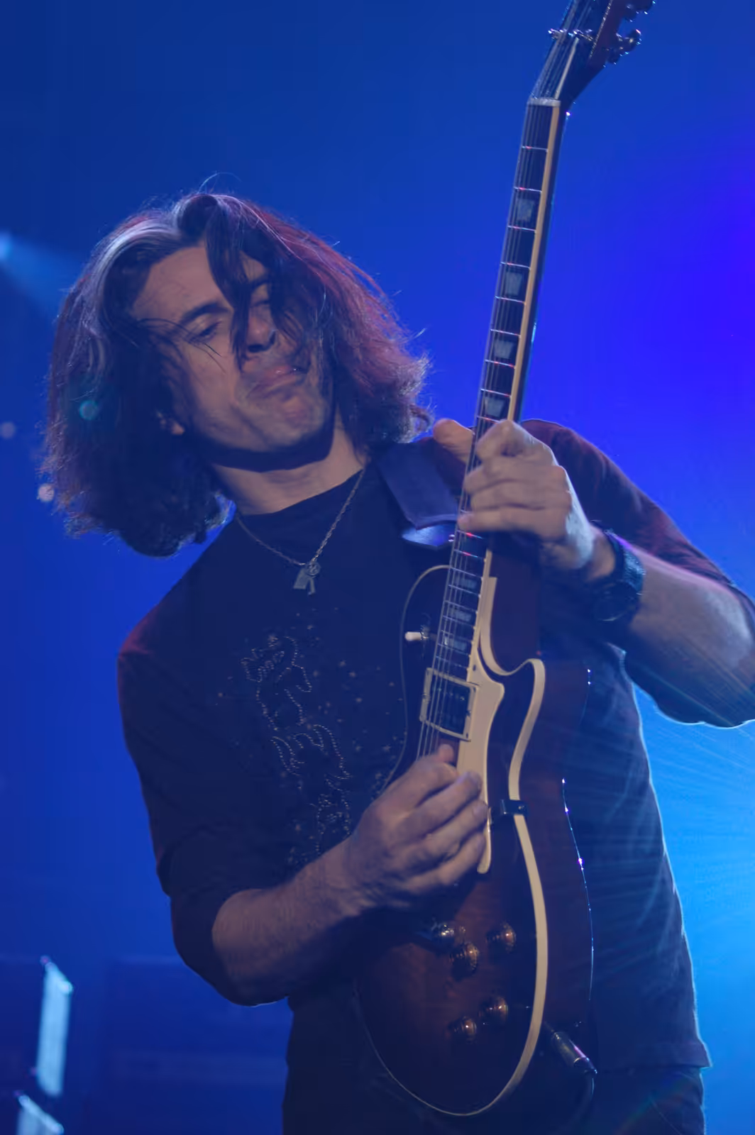 Alex Skolnick of Testament playing a guitar solo on stage in Poland in 2007.