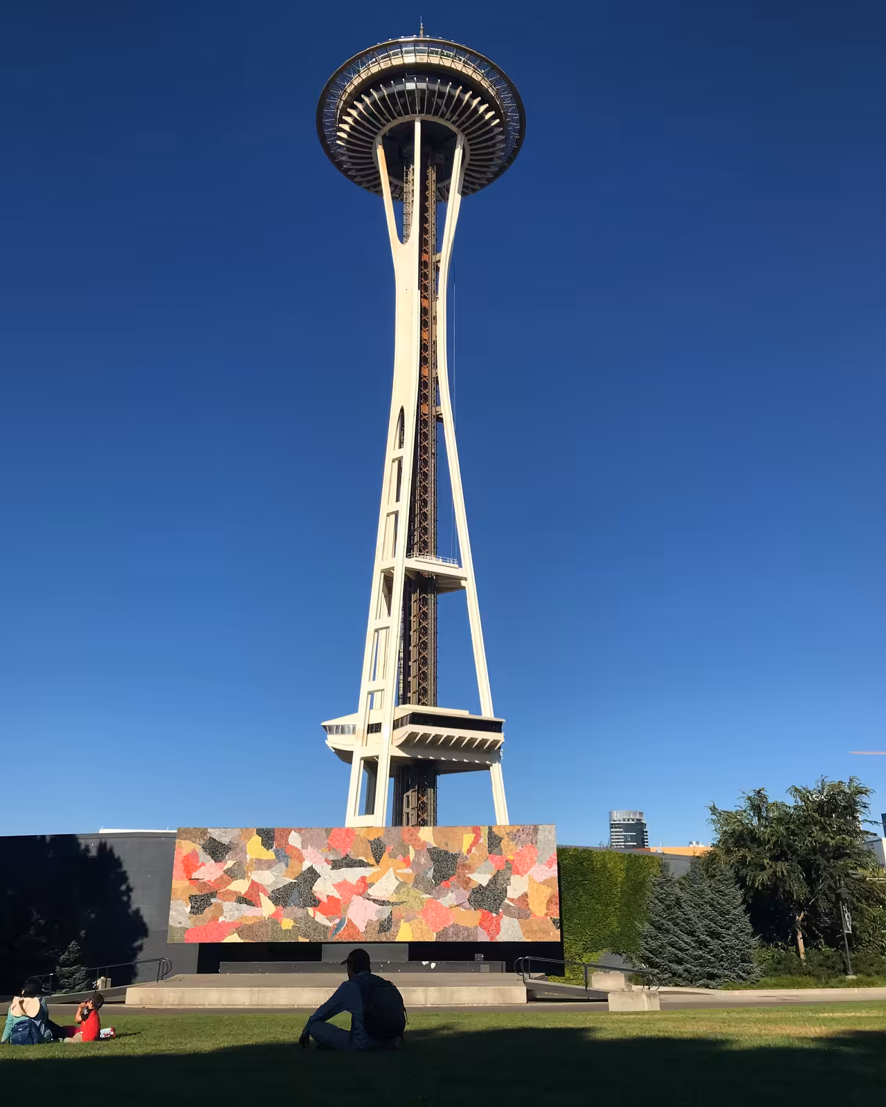 The Seattle Space Needle rising above the city skyline with a clear sky behind it in 2018.