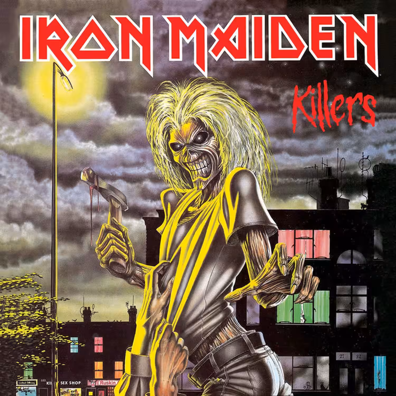 The 1981 Iron Maiden Killers album cover by Derek Riggs, showing Eddie the Head wielding a bloodied axe over a victim in a fog-shrouded London alley.